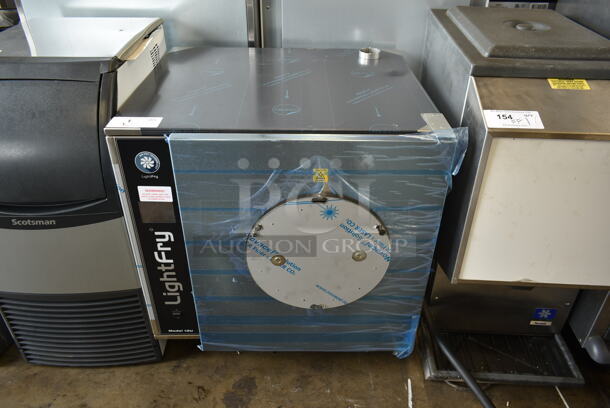 BRAND NEW SCRATCH AND DENT! 2022 Lightfry LF12U-4 Stainless Steel Commercial Electric Powered Air Fryer. Stock Picture Used as Gallery. 220 Volts, 3 Phase.  - Image 9 of 9