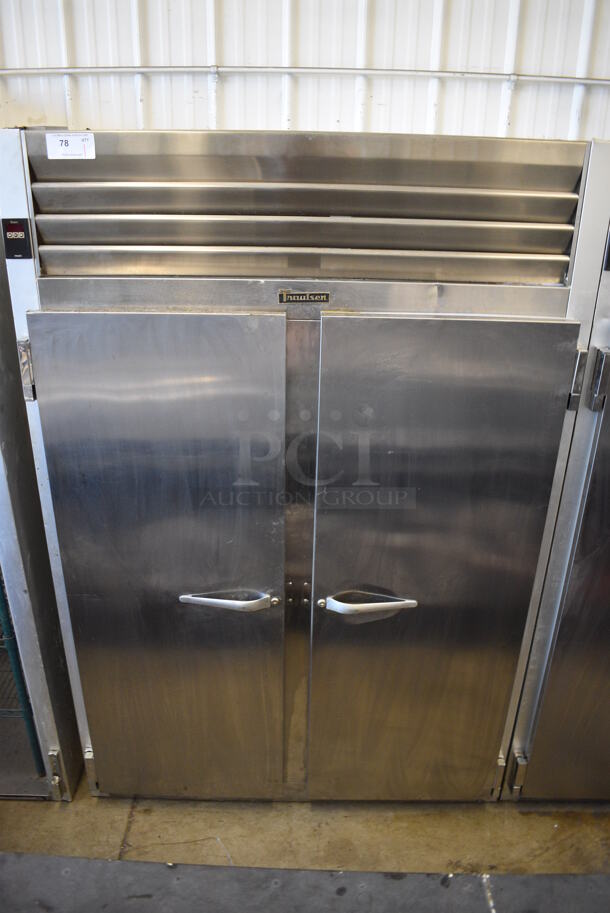 Traulsen Model G22010 Stainless Steel Commercial 2 Door Reach In Freezer w/ Poly Coated Racks. 115 Volts, 1 Phase. 52x34x77. Tested and Working!