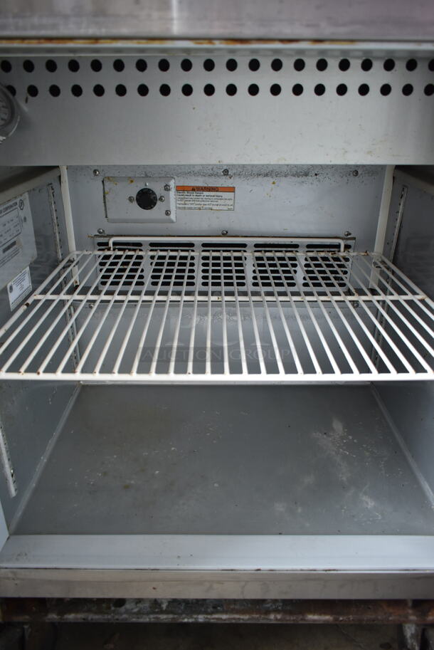 Beverage Air SPE27-B Stainless Steel Commercial Sandwich Salad Prep Table on Commercial Casters. 115 Volts, 1 Phase. Tested and Powers On But Does Not Get Cold - Image 3 of 4