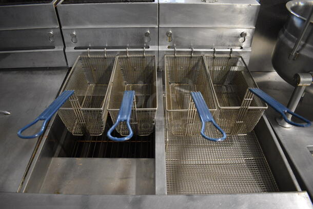 Pitco Frialator SG14-JS Stainless Steel Commercial Natural Gas Powered Floor Style 2 Bay Deep Fat Fryer w/ Right Side Pitco Frialator SGBNB14-0 Dumping Station, 4 Metal Fry Baskets and 2 Lids on Commercial Casters. 122,000 BTU. 47x35x46 - Image 2 of 12