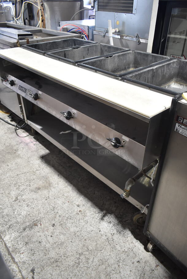 Vollrath 38104 Stainless Steel Commercial Floor Style Electric Powered 4 Bay Steam Table on Commercial Casters. 120 Volts, 1 Phase. Cannot Test Due To Plug Style - Image 1 of 9