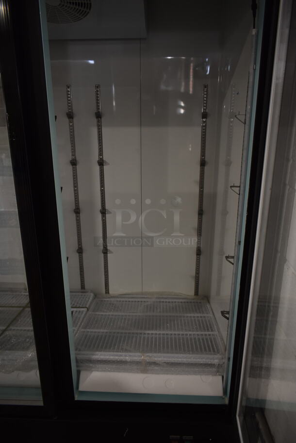 BRAND NEW SCRATCH AND DENT! 2023 Avantco 178GDC69HCB Metal Commercial 3 Door Reach In Cooler Merchandiser w/ Poly Coated Racks. 115 Volts, 1 Phase. Stock Picture Used as Gallery. Tested and Working! - Image 8 of 9
