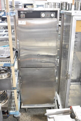 Henny Penny HC 900 Stainless Steel Commercial 2 Half Size Door Pass Through Heated Holding Cabinet on Commercial Casters. 220 Volts.