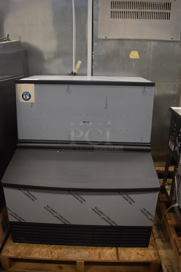 BRAND NEW SCRATCH AND DENT! 2022 Hoshizaki KM-301BAJ Ice Machine Crescent Cuber Icemaker with Built in Storage Bin. 115 Volt 1 Phase - Image 1 of 6