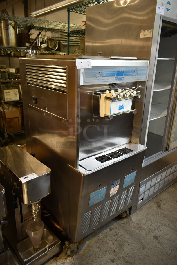 Taylor 754-33 Stainless Steel Commercial Floor Style Water Cooled 2 Flavor w/ Twist Soft Serve Ice Cream Machine on Commercial Casters. 208-230 Volts, 3 Phase. - Image 2 of 10
