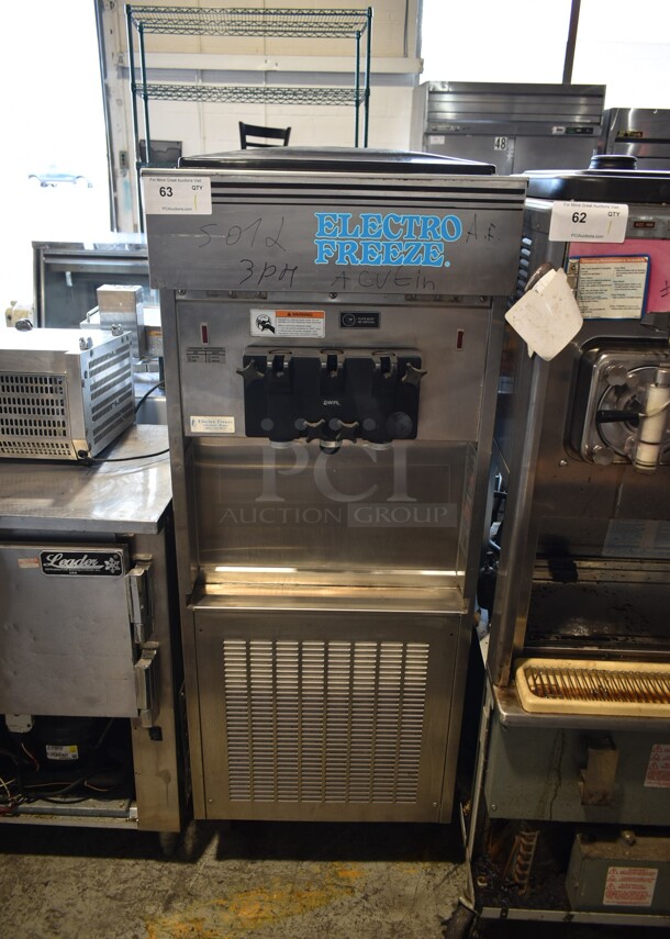 Electro Freeze SL500-132 Stainless Steel Commercial Floor Style Water Cooled 2 Flavor w/ Twist Soft Serve Ice Cream Machine on Commercial Casters. 208-230 Volts, 3 Phase.  - Image 1 of 6