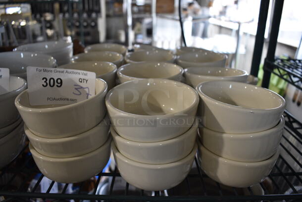 37 White Ceramic Bowls. 4.5x4.5x2. 37 Times Your Bid!