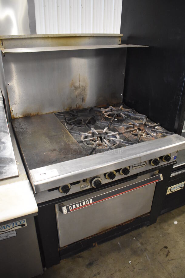 Garland Stainless Steel Commercial Natural Gas Powered 4 Burner Range w/ Left Side Flat Top Griddle, Oven, Over Shelf and Back Splash. 36x30x60 - Image 2 of 6