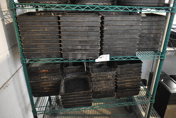 ALL ONE MONEY! Two Tier Lot of 121 Metal Baking Pans.