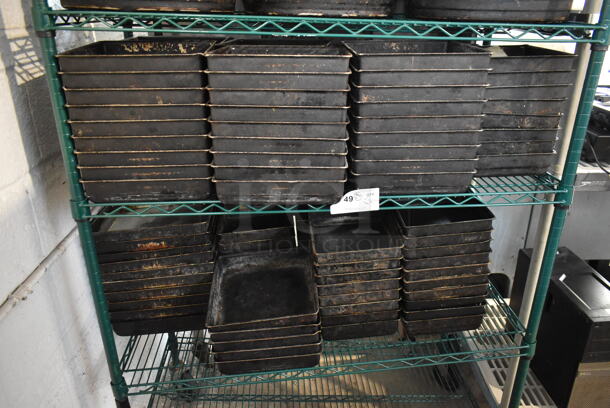 ALL ONE MONEY! Two Tier Lot of 121 Metal Baking Pans. - Image 1 of 4