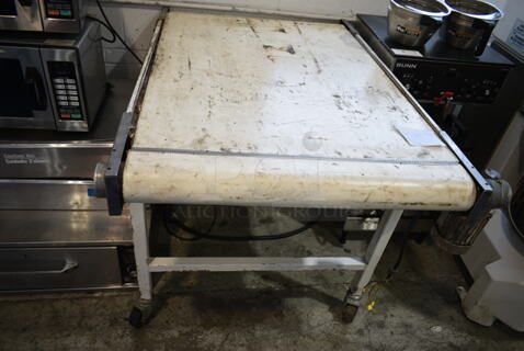 Metal Commercial Conveyor Belt on Commercial Casters. 208/240 Volts. 