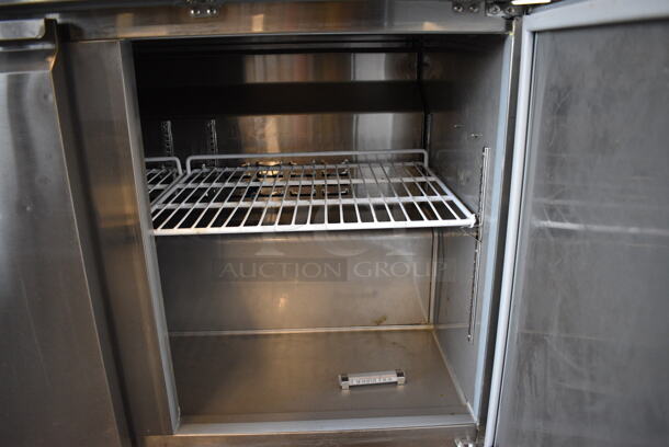Avantco 178SSUC48RHC Stainless Steel Commercial 2 Door Undercounter Cooler on Commercial Casters. 115 Volts, 1 Phase. Unit Was Only Used a Few Times as a Demonstration at a Trade Show. 47.5x29.5x35.5. Tested and Working! - Image 4 of 7