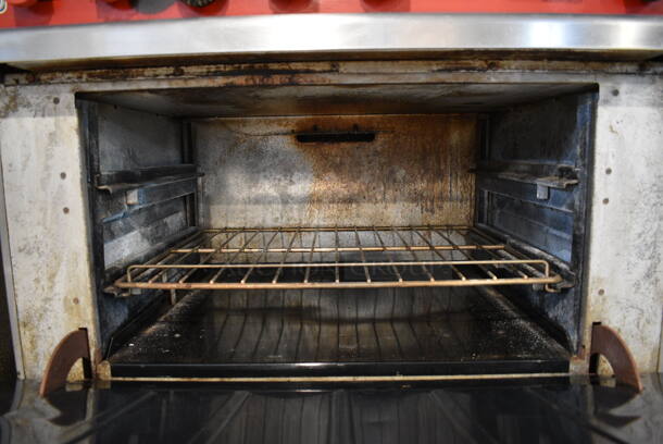Vulcan 36L-574 Stainless Steel Commercial Natural Gas Powered 6 Burner Range w/ Oven, Over Shelf and Back Splash on Commercial Casters. 36x31x61 - Image 7 of 9