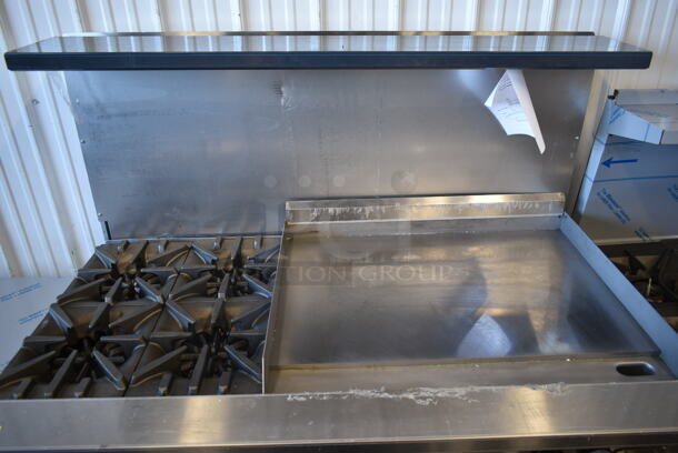 BRAND NEW SCRATCH AND DENT! Garland G60-4G36RR Stainless Steel Commercial Natural Gas Powered 4 Burner Range w/ Flat Top, 2 Ovens, Over Shelf and Back Splash.  - Image 2 of 10