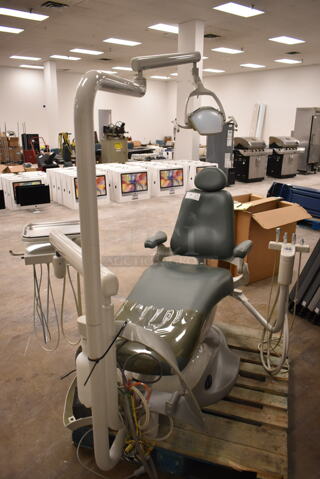 Pelton & Crane SP 30 Dental Exam Chair w/ Pedal and Over Head Light. (front room)