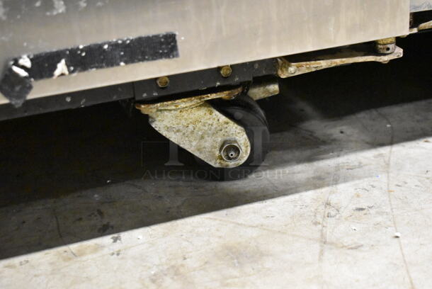 2014 True TG2R-2S ENERGY STAR Stainless Steel Commercial 2 Door Reach In Cooler w/ Poly Coated Racks on Commercial Casters. 115 Volts, 1 Phase. Tested and Working! - Image 4 of 8