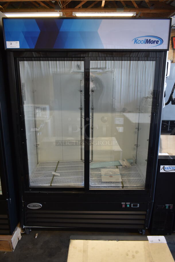 BRAND NEW SCRATCH AND DENT! 2023 KoolMore MDR-2D-GSLD Metal Commercial 2 Door Reach In Cooler Merchandiser w/ Poly Coated Racks on Commercial Casters. 115 Volts, 1 Phase. Tested and Working! - Image 1 of 9