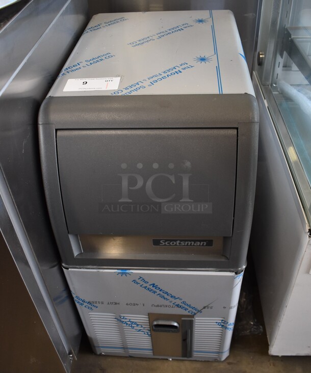 BRAND NEW SCRATCH AND DENT! Scotsman CU0515GA-1E Stainless Steel Commercial Self Contained Undercounter Gourmet Cube Ice Machine. 115 Volts, 1 Phase.  - Image 1 of 6