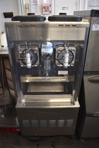 Taylor Model 342D-27 Stainless Steel Commercial Floor Style Air Cooled 2 Flavor Frozen Beverage Machine w/ Drink Mixer Attachment on Commercial Casters. 208-230 Volts, 1 Phase. 26x34x60.