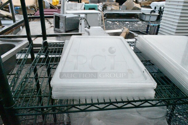 Green Finish 5 Tier Wire Shelving Unit on Commercial Casters w/ Contents Including Poly Lids and Poly Pitchers. BUYER MUST DISMANTLE. PCI CANNOT DISMANTLE FOR SHIPPING. PLEASE CONSIDER FREIGHT CHARGES.  - Image 2 of 8
