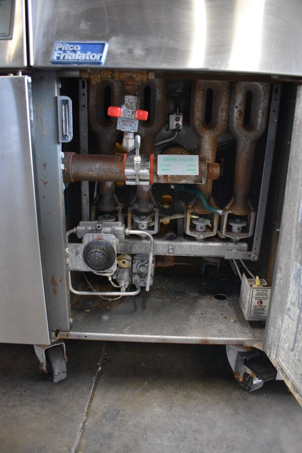 Pitco Frialator Model F14S-V Stainless Steel Commercial Floor Style Propane Gas 2 Bay Fryer w/ Center Dumping Station on Commercial Casters. 110,000 BTU. 49x32x54 - Image 9 of 10