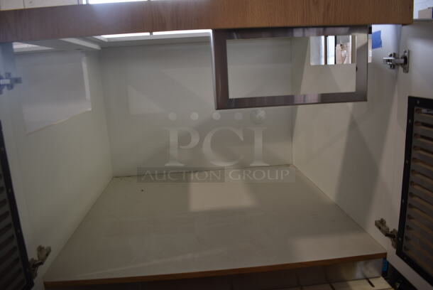 BRAND NEW! Wood Pattern 4 Door Counter. Missing Countertop and One Door. - Image 9 of 9
