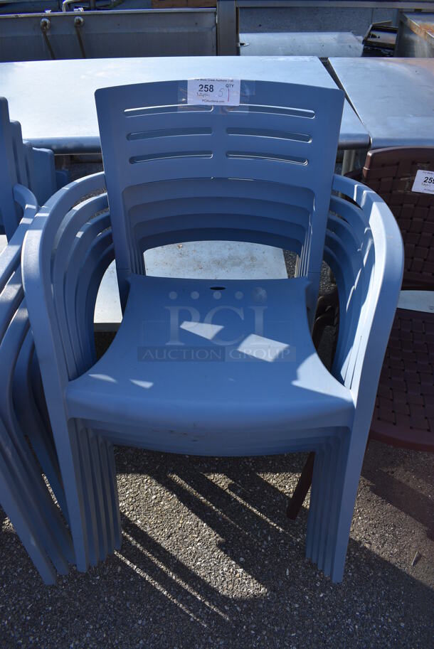 5 Blue Poly Patio Chairs w/ Arm Rests. 23.5x17x33. 5 Times Your Bid!