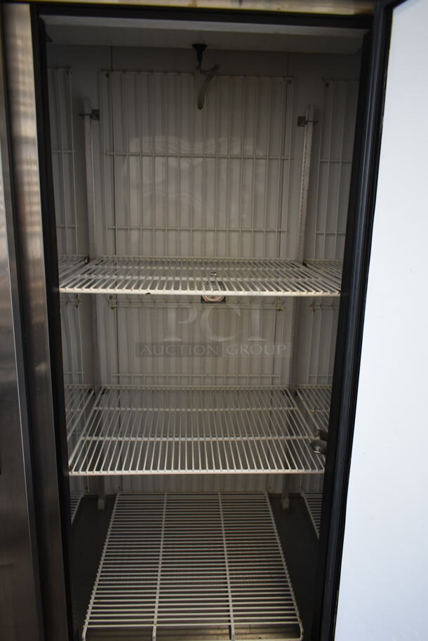 2015 True T-72F ENERGY STAR Stainless Steel Commercial 3 Door Reach In Freezer w/ Poly Coated Racks on Commercial Casters. 115 Volts, 1 Phase. Tested and Working! - Image 8 of 9