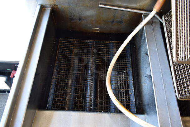 2015 Henny Penny OFG-342 Stainless Steel Commercial Floor Style Natural Gas Powered 2 Bay Deep Fat Fryer w/ Filtration System on Commercial Casters. 240,000 BTU.  - Image 4 of 11