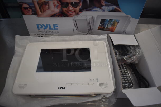 IN ORIGINAL BOX! Pyle PLMRDV74 7" Portable Multimedia Player. 10.5x2x7 - Image 1 of 7