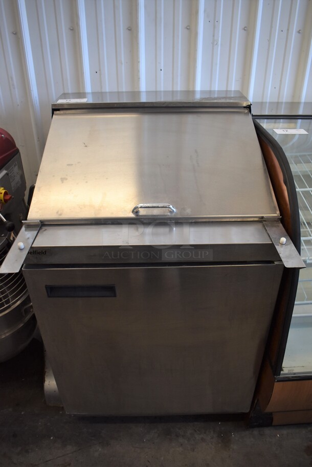 2011 Delfield 4427N-12M Stainless Steel Commercial Sandwich Salad Prep Table Bain Marie Mega Top on Commercial Casters. 115 Volts, 1 Phase. 27.5x33x45. Tested and Powers On But Temps at 50 Degrees