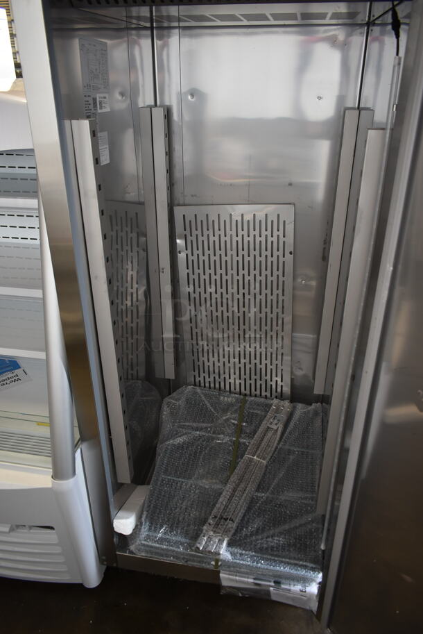 BRAND NEW SCRATCH AND DENT! 2023 Avantco 178Z1FHC Stainless Steel Commercial Single Door Reach In Freezer w/ Poly Coated Racks on Commercial Casters. 115 Volts, 1 Phase. Tested and Working! - Image 5 of 7