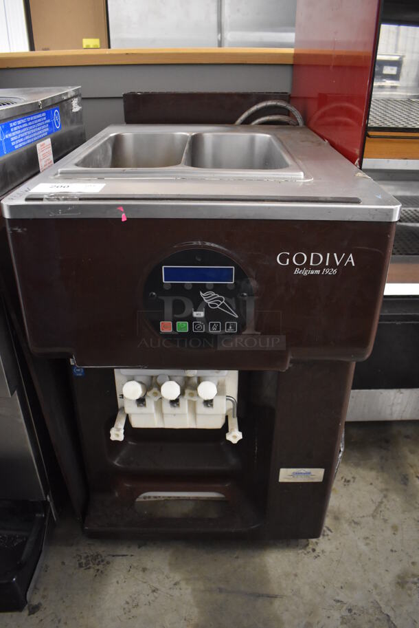 Godiva Stainless Steel Commercial Countertop Air Cooled 2 Flavor w/ Twist Soft Serve Ice Cream Machine. 208-230 Volts, 3 Phase. 21.5x35x36 - Image 1 of 7