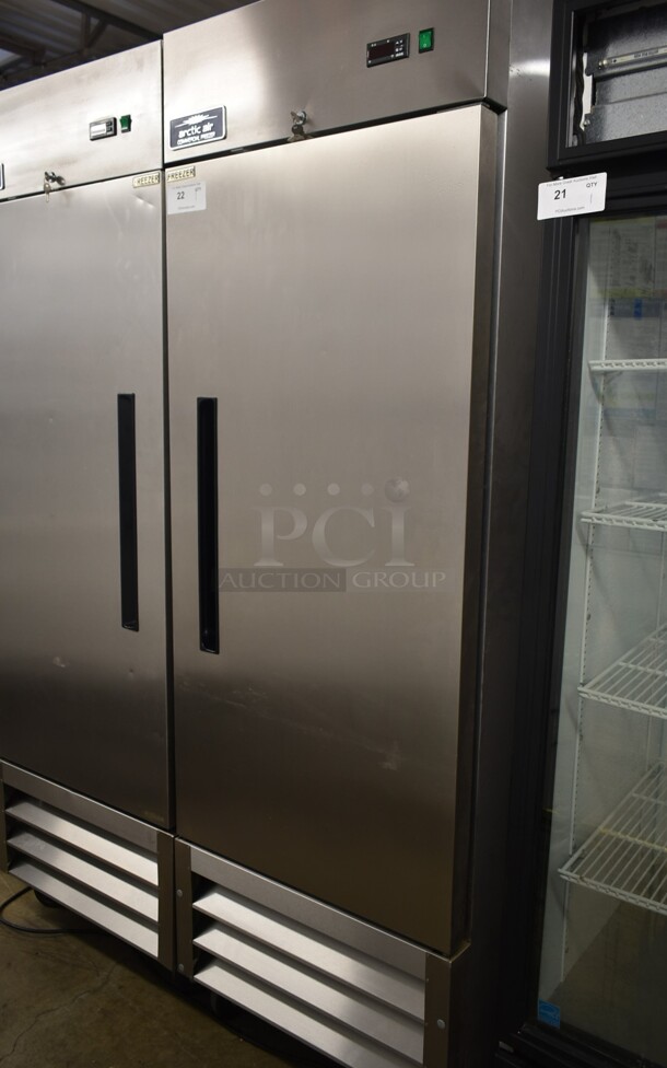 Arctic Air AF23 Stainless Steel Commercial Single Door Reach In Freezer w/ Poly Coated Racks on Commercial Casters. 115 Volts, 1 Phase. Tested and Working! - Image 1 of 5