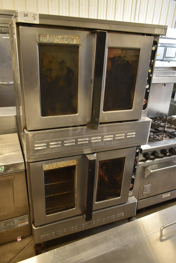 2 Blodgett Stainless Steel Commercial Natural Gas Powered Full Size Convection Ovens w/ View Through Doors, Metal Oven Racks and Thermostatic Controls on Commercial Casters. 2 Times Your Bid!