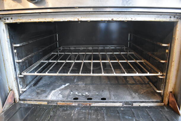 Garland Model M43R Stainless Steel Commercial Natural Gas Powered 6 Burner Range w/ Oven and Backsplash on Commercial Casters. 34x38x51.5 - Image 3 of 7