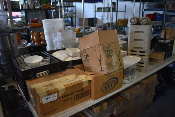 ALL ONE MONEY! Lot of Tabletop Full of Various Items Including Glasses, Dishes, Ice Scoopers and Poly Bins. Does Not Include Table. - Image 1 of 11
