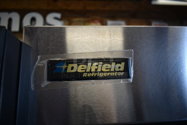 Delfield 6051-S Stainless Steel Commercial 2 Door Reach In Cooler w/ Poly Coated Racks on Commercial Casters. 115 Volts, 1 Phase. Tested and Working! - Image 9 of 10