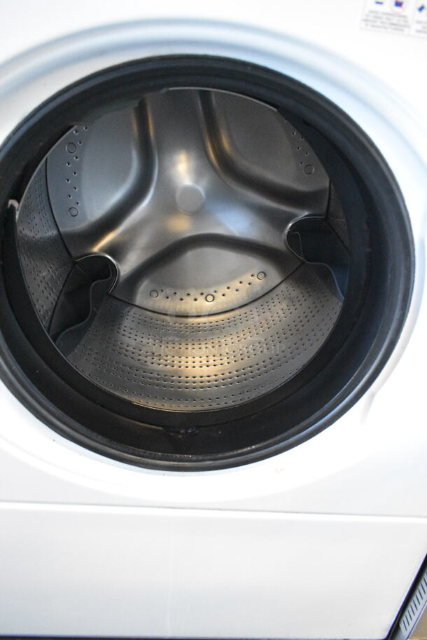 BRAND NEW SCRATCH AND DENT! Speed Queen Front Load Combo Washer and Dryer. 120/208-240 Volts.  - Image 2 of 7