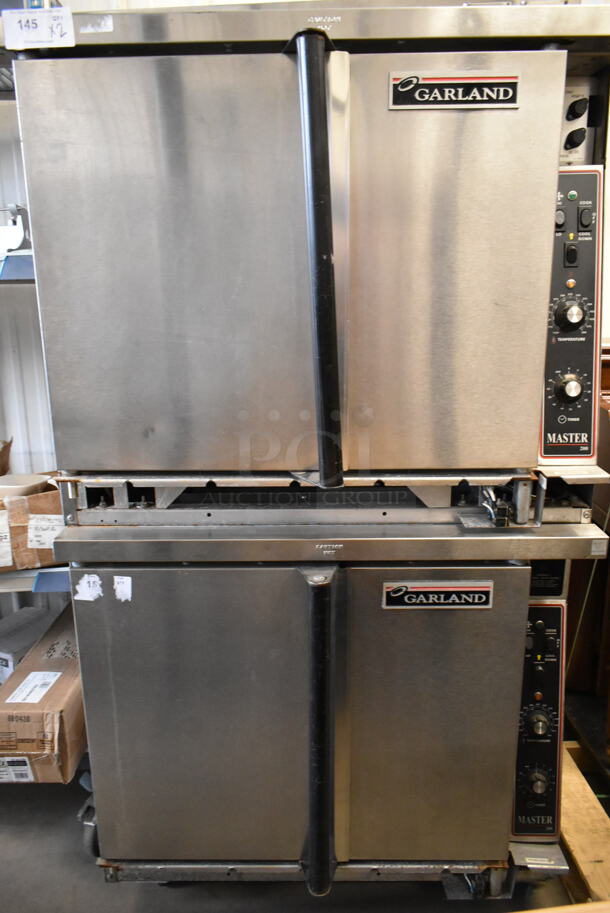 2 Garland MCO-ES-10S Master 200 Stainless Steel Commercial Electric Powered Full Size Convection Oven w/ Solid Doors, Metal Oven Racks and Thermostatic Controls on Commercial Casters. 460 Volts, 3 Phase. 2 Times Your Bid! - Item #1113257