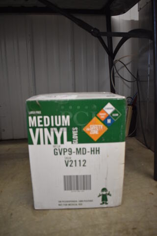 Box of 10 BRAND NEW Medium Vinyl Gloves.