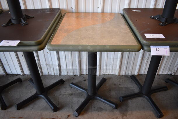 Green / Gray and Tan Dining Height Table w/ Green Rim on Black Metal Table Base. Stock Picture - Cosmetic Condition May Vary. 20x24x30