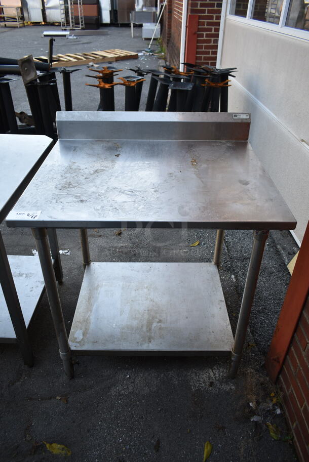Stainless Steel Commercial Table w/ Back Splash and Under Shelf. - Image 1 of 4