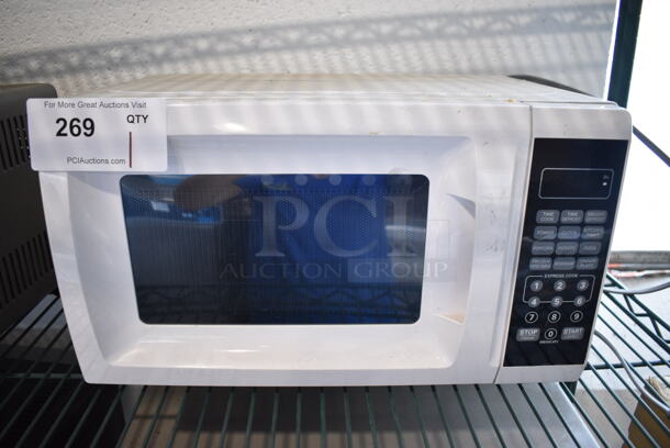 Walmart Model EM720CGA-W Countertop Microwave Oven w/ Plate. 120 Volts, 1 Phase. 17x12x10 - Image 1 of 4