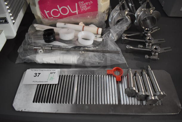 ALL ONE MONEY! Lot of Various Ice Cream Machine Parts Including Front Piece, 2 Augers, Drip Tray Grate, 4 Knobs and 3 Handles - Image 2 of 5