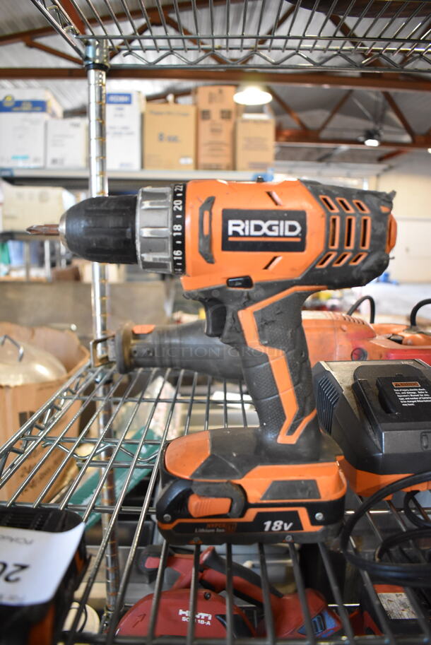 ALL ONE MONEY! Tier Lot of Various Tools Including Rigid R3001 Saw, Rigid R860052 Drill, Rigid Battery Charger, Ramset MasterShot Fastener, Ryobi P246 Series D Multi Tool, DeWalt DW9099 Drill, DeWalt Battery and Charger, DeWalt DWE4011 Angle Grinder, DeWalt D28402 Angle Grinder. - Image 4 of 12