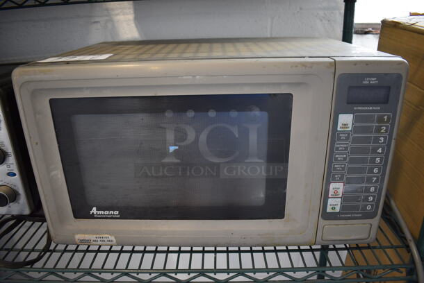 Amana Metal Commercial Countertop Microwave Oven. 21x15x12.5 - Image 1 of 4