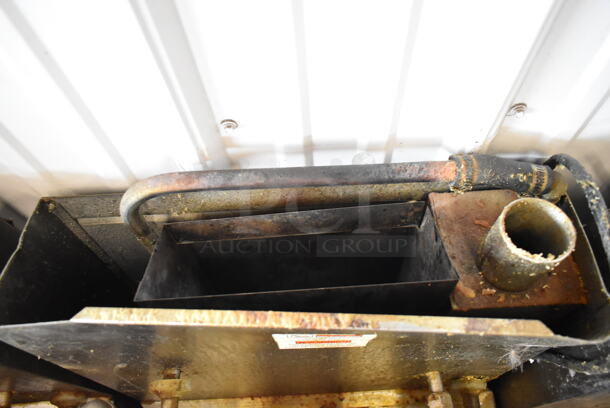 Henny Penny 600 Stainless Steel Commercial Floor Style Natural Gas Powered Pressure Fryer w/ Metal Fry Basket on Commercial Casters. 80,000 BTU. - Image 5 of 7