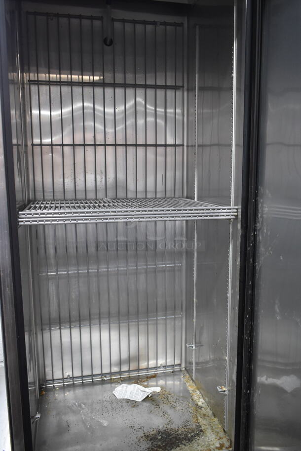 2017 True T-19F Stainless Steel Commercial Single Door Reach In Cooler w/ Poly Coated Racks on Commercial Casters. 1 Caster Needs To Be Reattached. 115 Volts, 1 Phase. Tested and Working! - Image 4 of 7