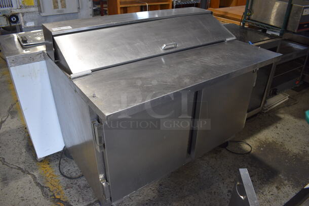 Beverage Air SP48-12C Stainless Steel Commercial Sandwich Salad Prep Table Bain Marie Mega Top on Commercial Casters. 115 Volts, 1 Phase. 48x34x43. Tested and Powers On But Temps at 55 Degrees
